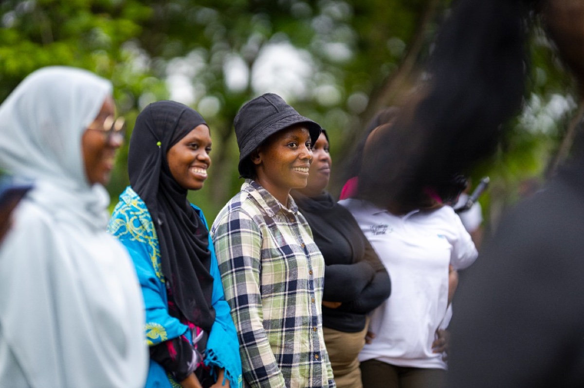 Young women from the network gathered outdoors