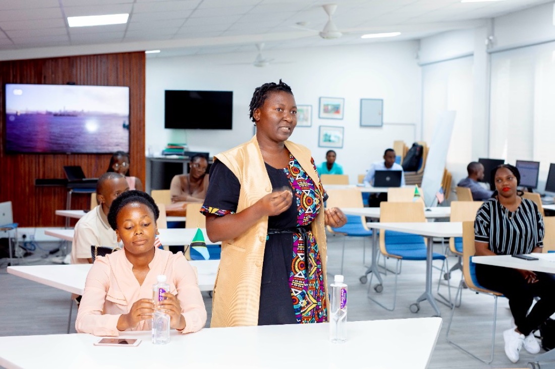 Young leader facilitating a professional training workshop