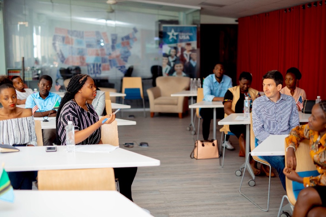 Young woman contributing in an education and research workshop