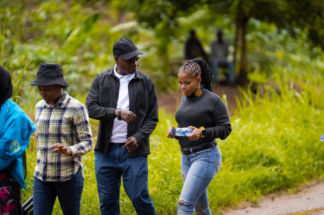 Young people on a field visit along a rural path in Tanzania